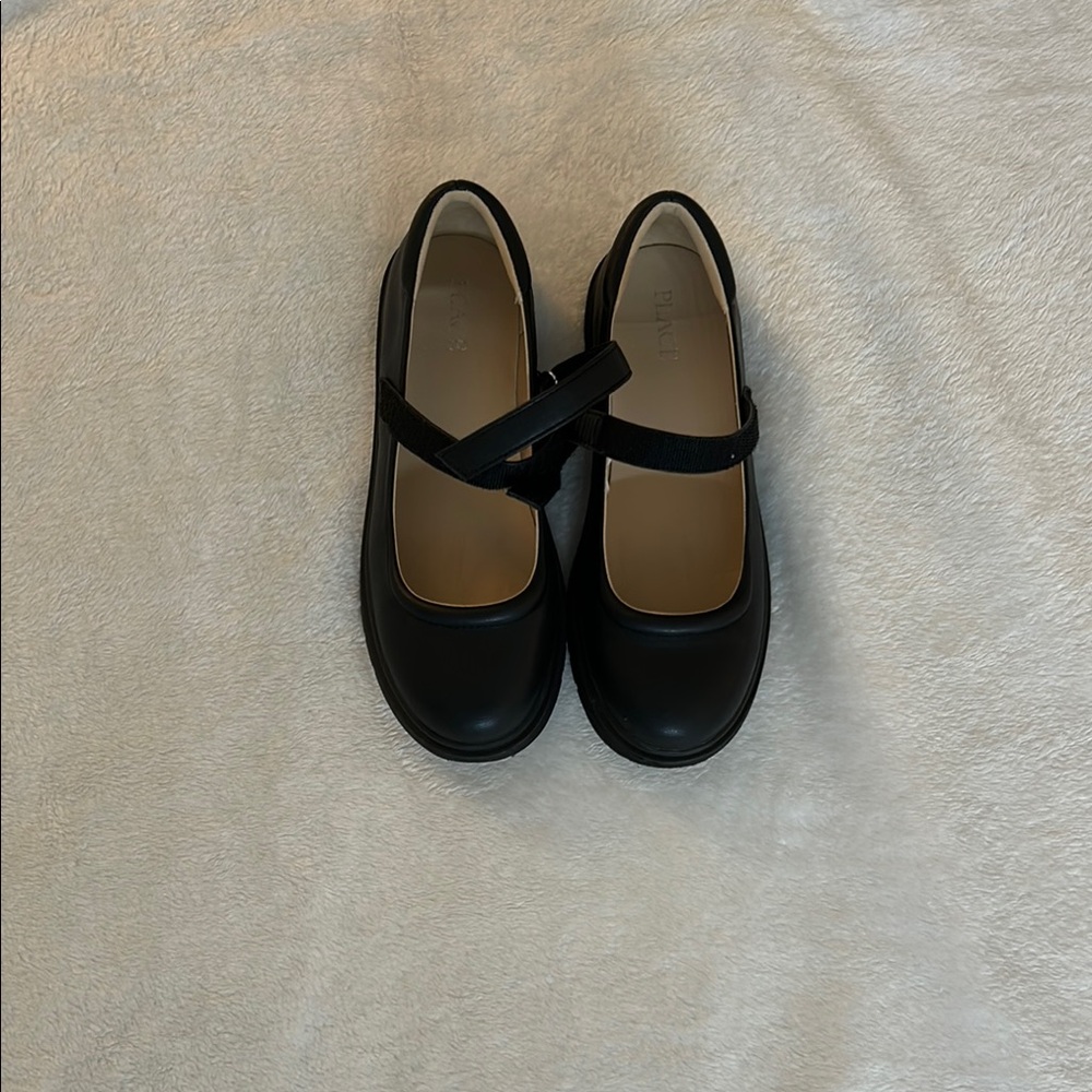 Place Black Leather Mary Janes